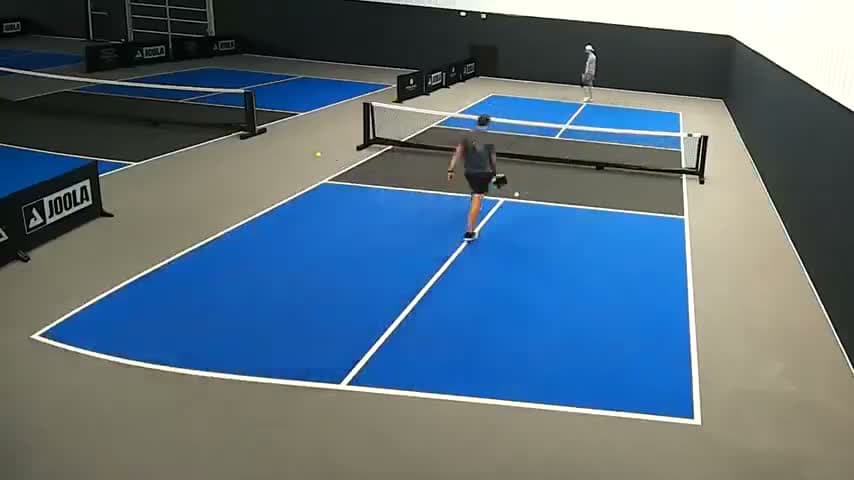 A real pickleball Film Room frame from the playable sample match